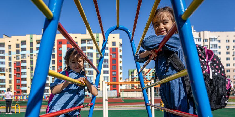 elementary school students playing on the school playground
